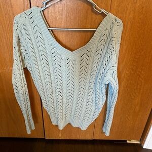 Sweater with twist back detail